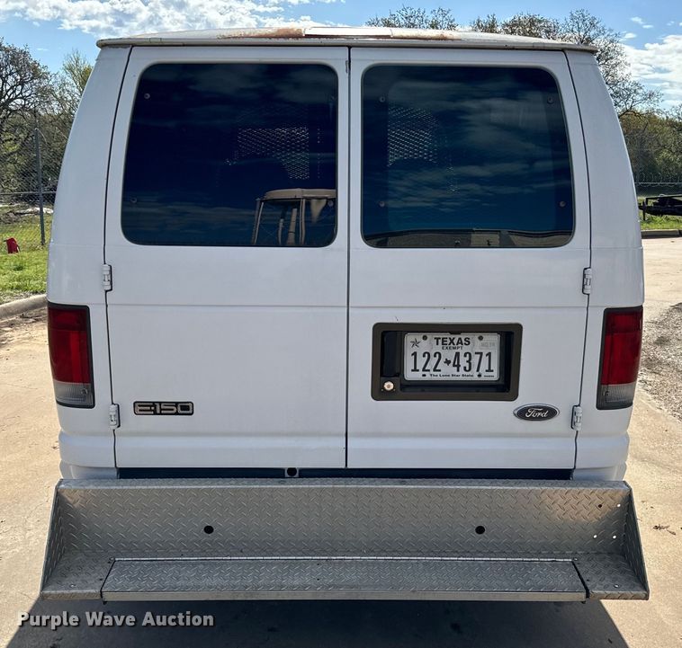 image for item EJ0374 2004 Ford E150 prisoner transport van