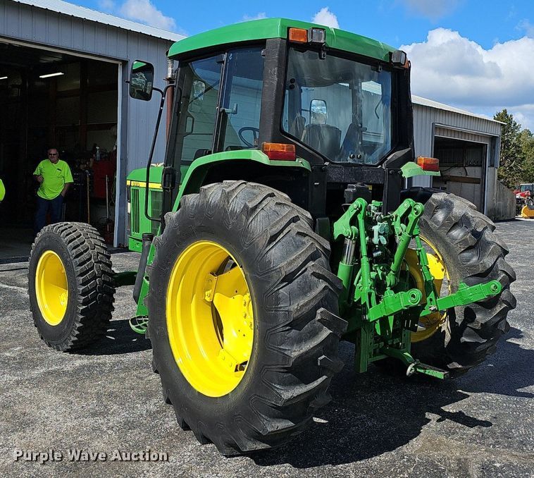 image for item EJ6241 2000 John Deere 6410 MFWD tractor