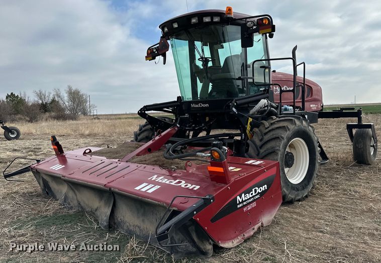 image for item OI9301 2016 MacDon M205 swather / windrower