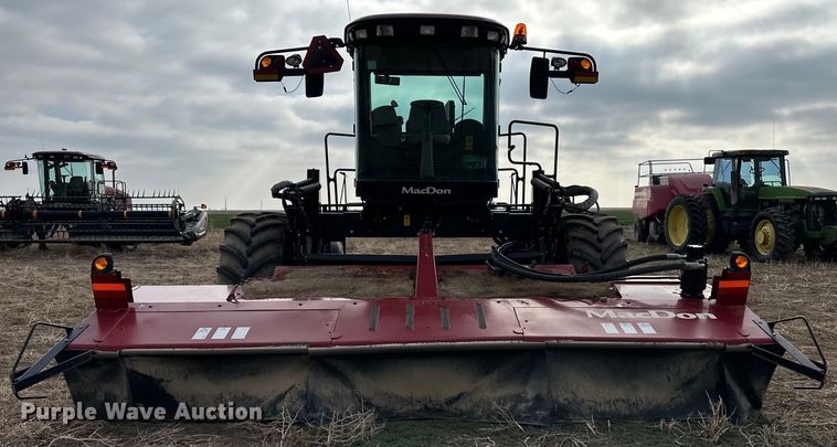 image for item OI9301 2016 MacDon M205 swather / windrower