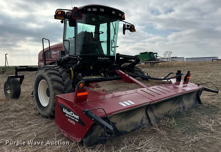 image for item OI9301 2016 MacDon M205 swather / windrower
