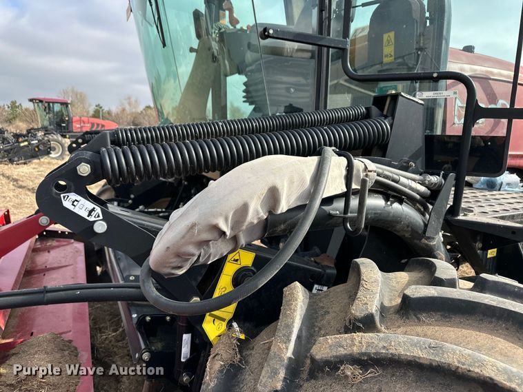 image for item OI9301 2016 MacDon M205 swather / windrower