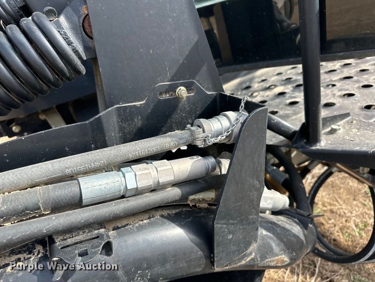 image for item OI9301 2016 MacDon M205 swather / windrower