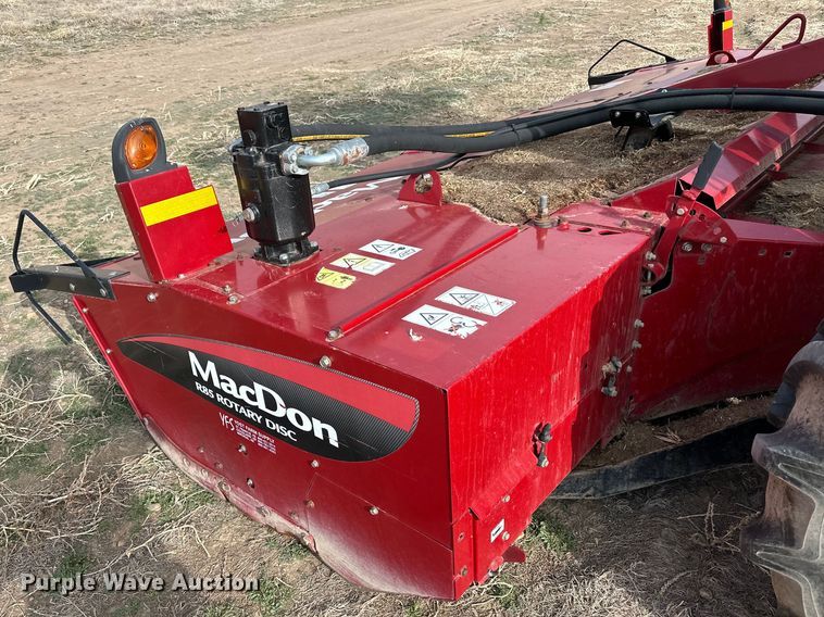 image for item OI9301 2016 MacDon M205 swather / windrower
