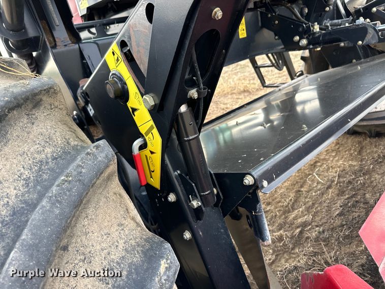 image for item OI9301 2016 MacDon M205 swather / windrower