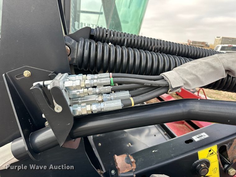 image for item OI9301 2016 MacDon M205 swather / windrower