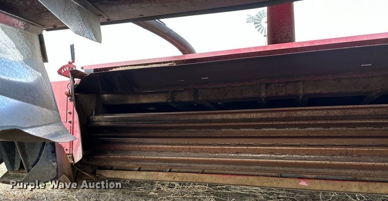 image for item OI9301 2016 MacDon M205 swather / windrower