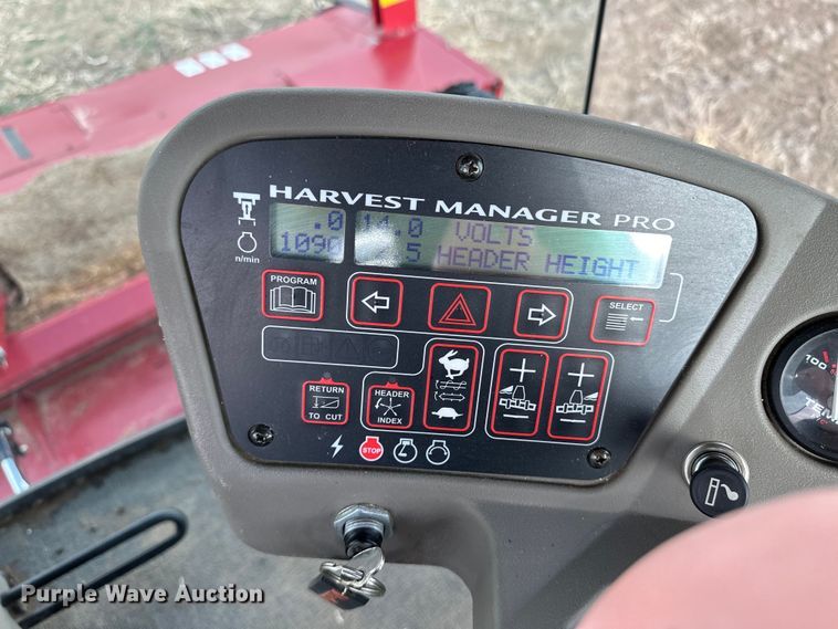 image for item OI9301 2016 MacDon M205 swather / windrower