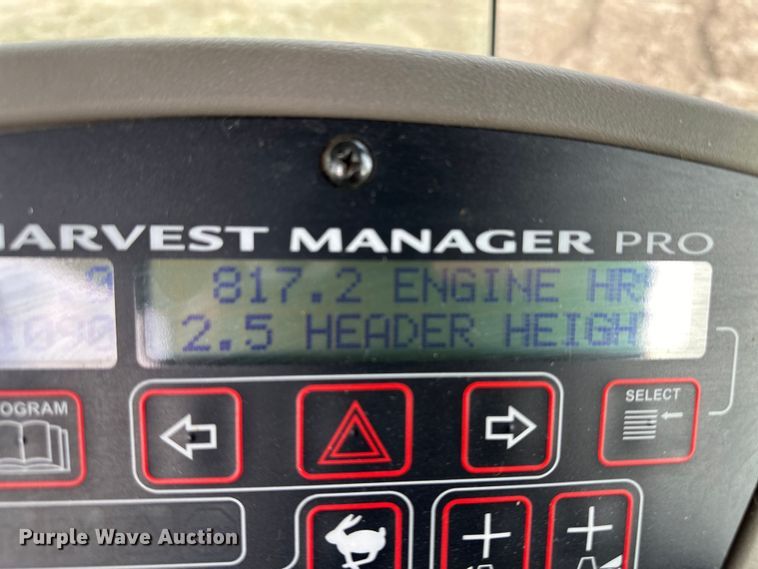 image for item OI9301 2016 MacDon M205 swather / windrower