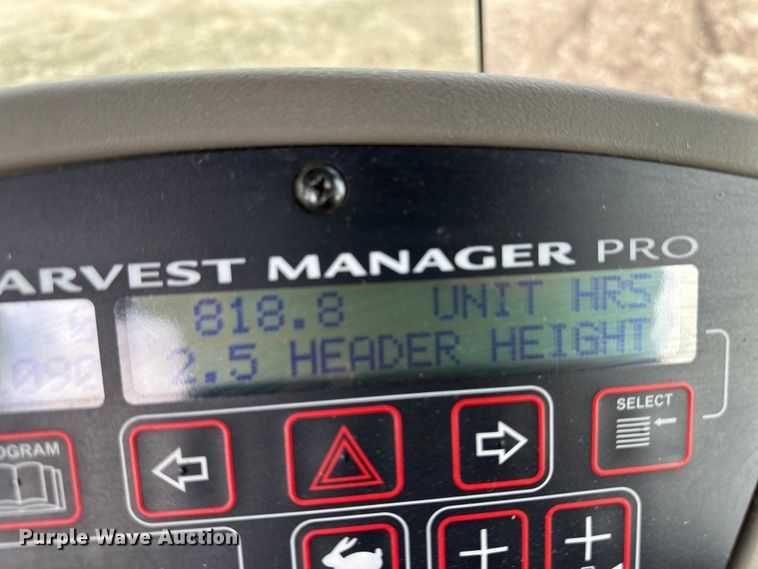 image for item OI9301 2016 MacDon M205 swather / windrower