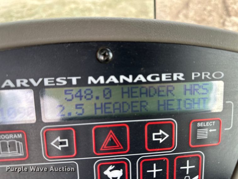 image for item OI9301 2016 MacDon M205 swather / windrower