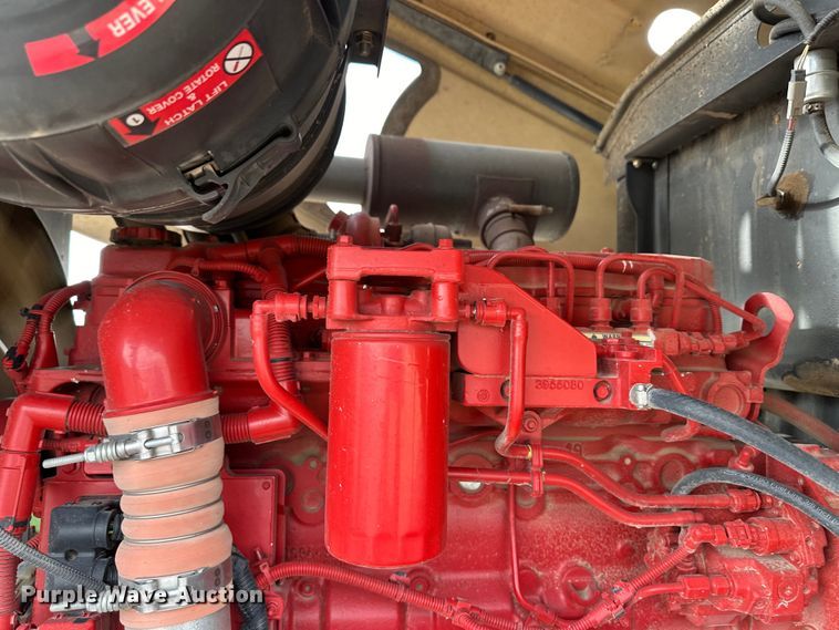 image for item OI9301 2016 MacDon M205 swather / windrower