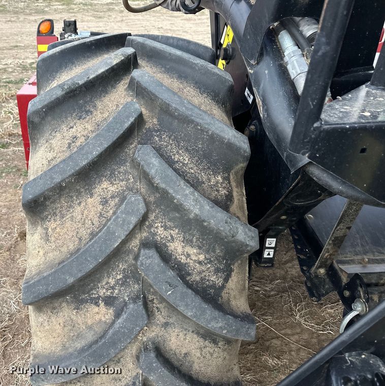 image for item OI9301 2016 MacDon M205 swather / windrower