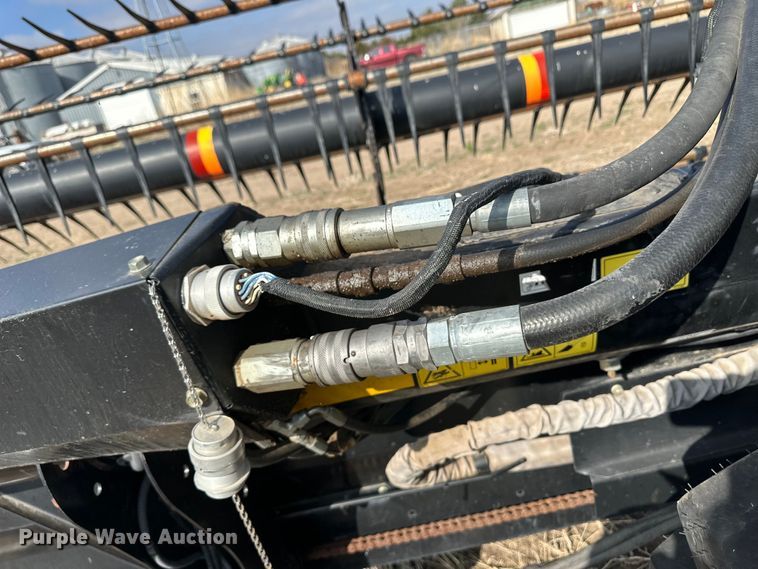 image for item OI9302 2013 MacDon M155 swather / windrower