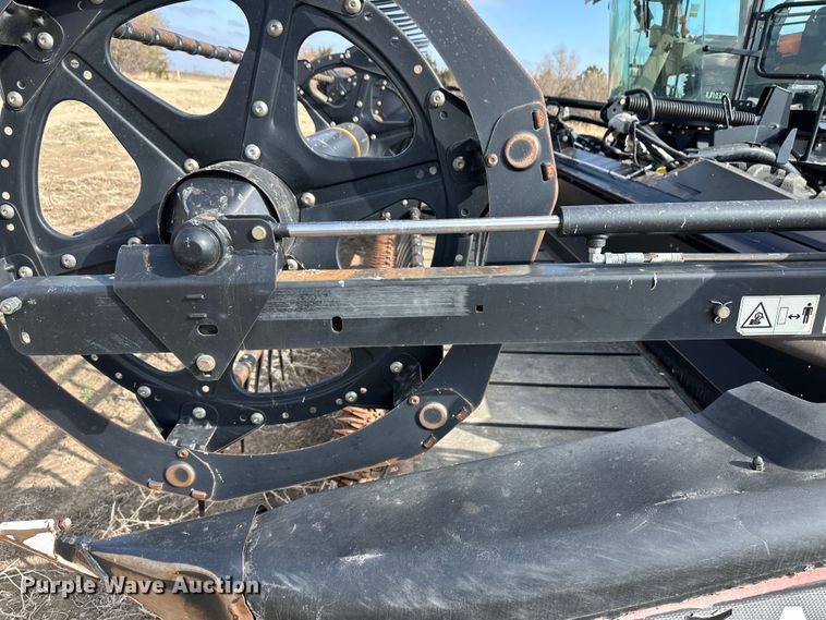 image for item OI9302 2013 MacDon M155 swather / windrower