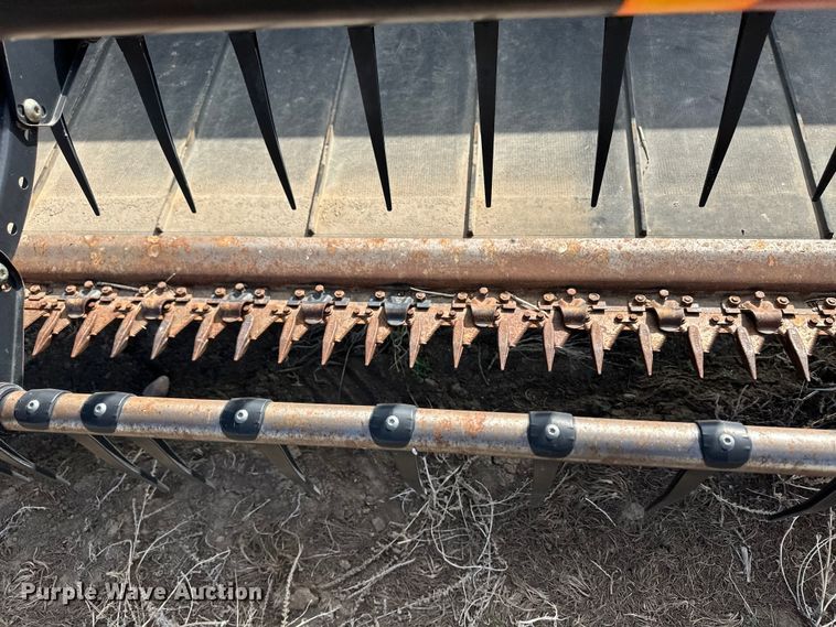 image for item OI9302 2013 MacDon M155 swather / windrower