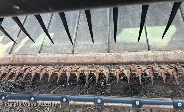 image for item OI9302 2013 MacDon M155 swather / windrower