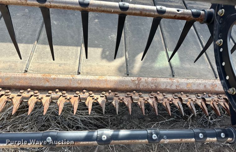 image for item OI9302 2013 MacDon M155 swather / windrower
