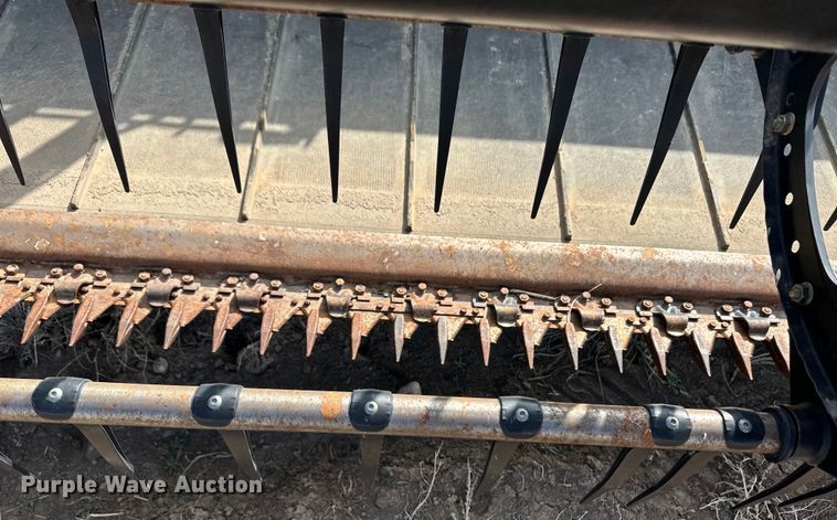 image for item OI9302 2013 MacDon M155 swather / windrower