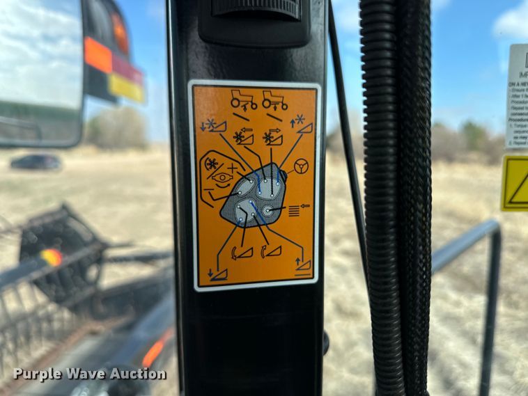 image for item OI9302 2013 MacDon M155 swather / windrower