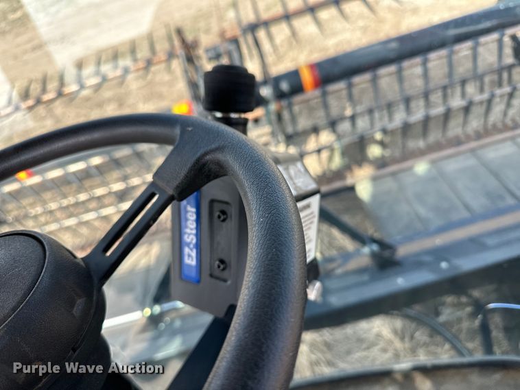 image for item OI9302 2013 MacDon M155 swather / windrower