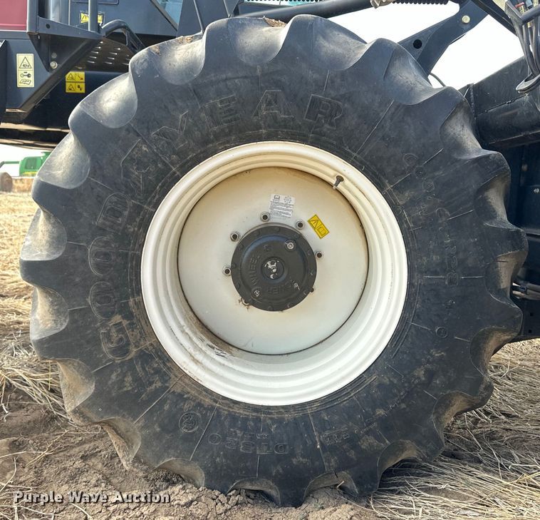 image for item OI9302 2013 MacDon M155 swather / windrower