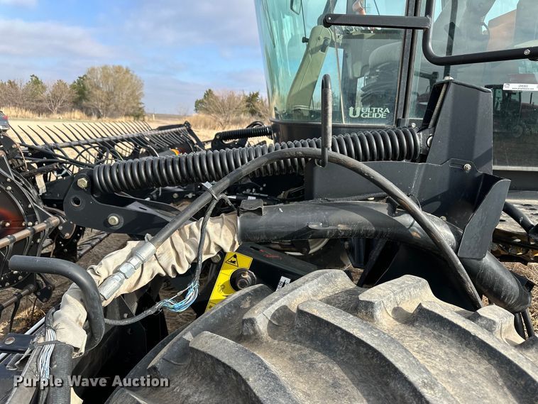 image for item OI9303 2014 MacDon M155 swather / windrower