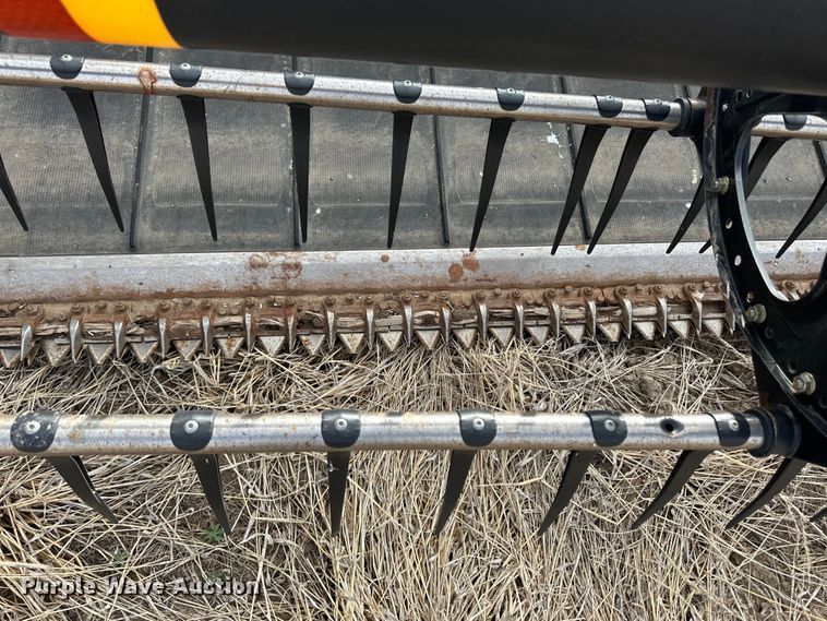 image for item OI9303 2014 MacDon M155 swather / windrower