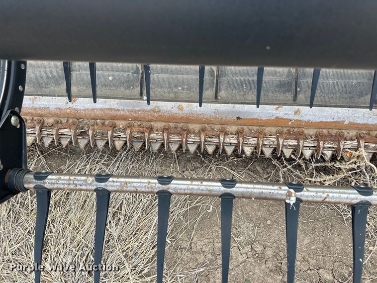 image for item OI9303 2014 MacDon M155 swather / windrower