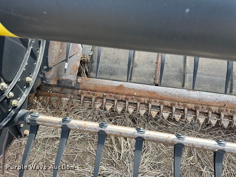 image for item OI9303 2014 MacDon M155 swather / windrower