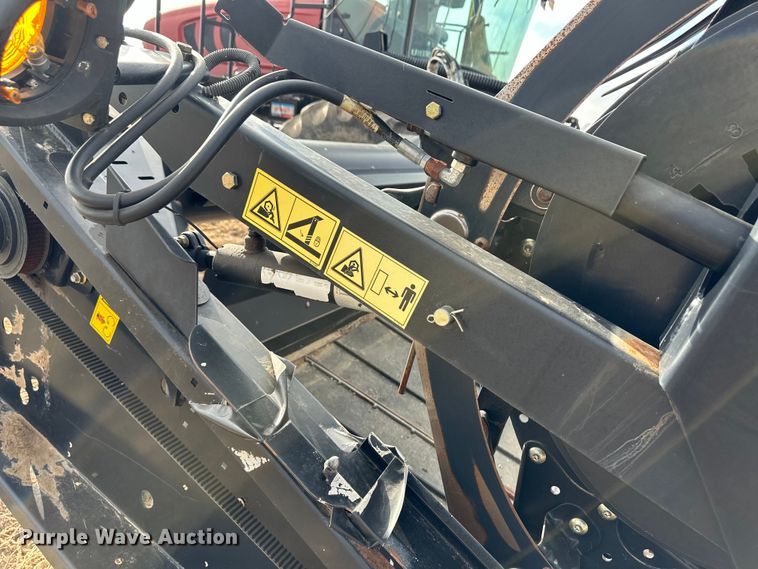 image for item OI9303 2014 MacDon M155 swather / windrower