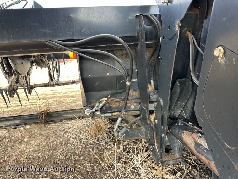 image for item OI9303 2014 MacDon M155 swather / windrower