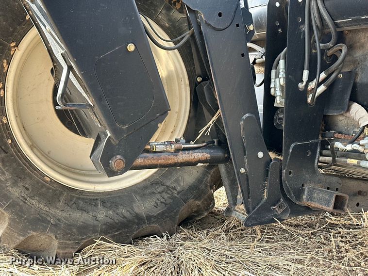 image for item OI9303 2014 MacDon M155 swather / windrower