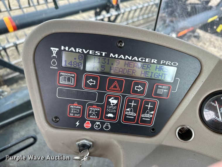 image for item OI9303 2014 MacDon M155 swather / windrower