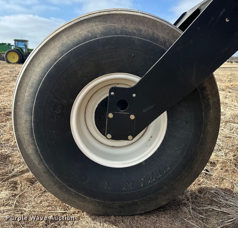 image for item OI9303 2014 MacDon M155 swather / windrower