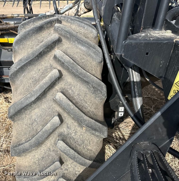 image for item OI9303 2014 MacDon M155 swather / windrower