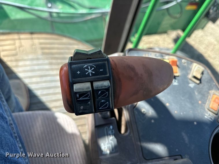 image for item OI9405 2004 John Deere 4895 swather / windrower