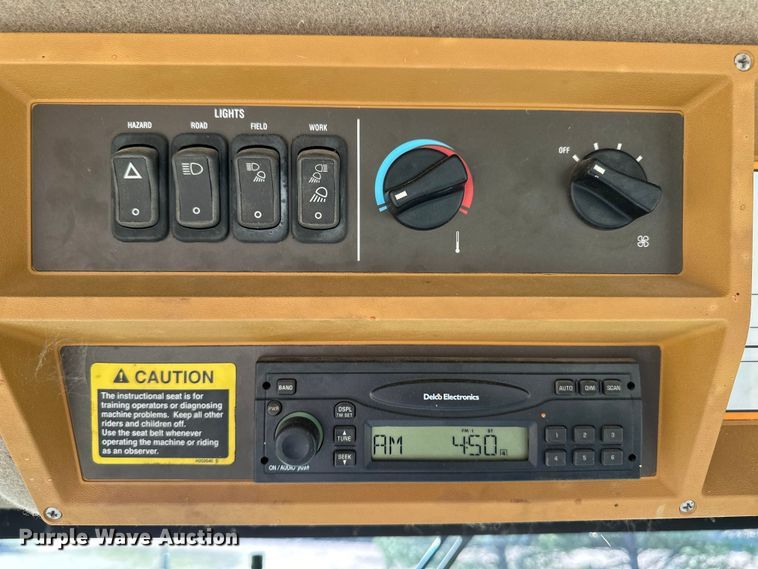 image for item OI9405 2004 John Deere 4895 swather / windrower