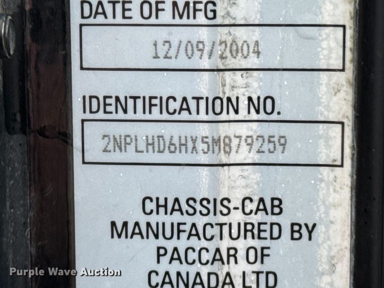 image for item ND9165 2005 Peterbilt 335 rollback truck