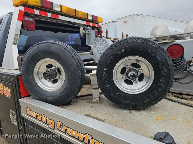 image for item DQ8671 2003 Ford F550 Super Duty XLT tow truck