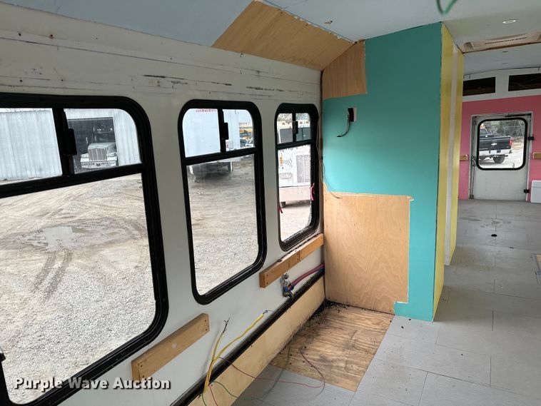 image for item EJ0393 2002 International  3400 shuttle bus