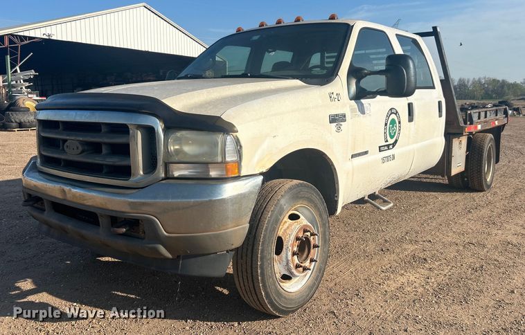 image for item NB9380 2002 Ford F450 Super Duty Crew Cab flatbed truck