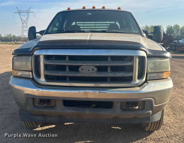 image for item NB9380 2002 Ford F450 Super Duty Crew Cab flatbed truck