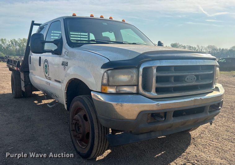 image for item NB9380 2002 Ford F450 Super Duty Crew Cab flatbed truck