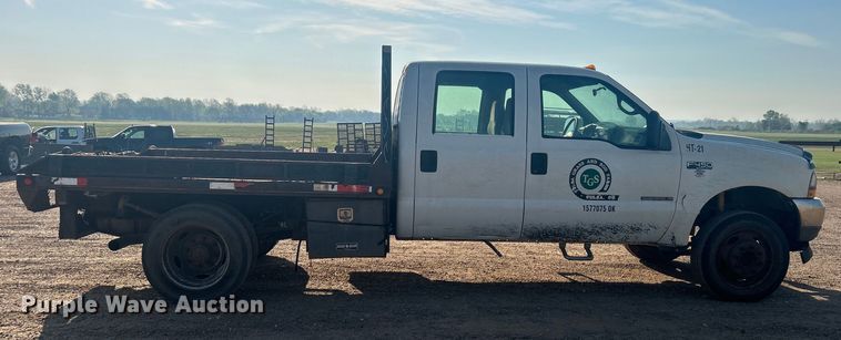 image for item NB9380 2002 Ford F450 Super Duty Crew Cab flatbed truck