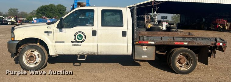 image for item NB9380 2002 Ford F450 Super Duty Crew Cab flatbed truck