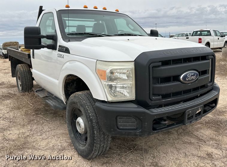 image for item OI9425 2012 Ford F350 Super Duty flatbed pickup truck