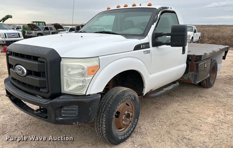 image for item OI9426 2012 Ford F350 Super Duty flatbed pickup truck