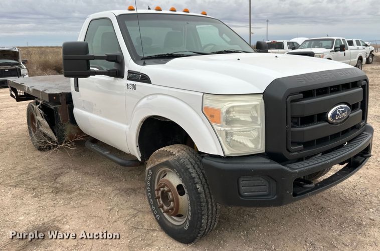 image for item OI9426 2012 Ford F350 Super Duty flatbed pickup truck