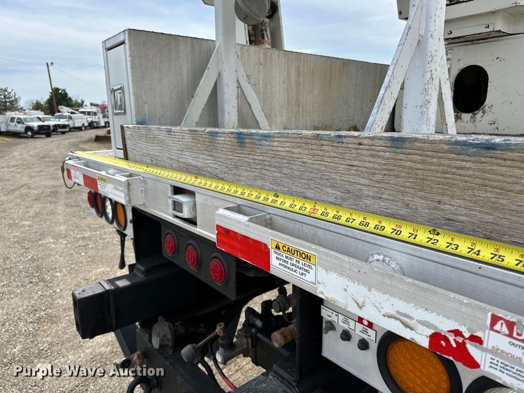 image for item EG1384 2009 Peterbilt  365 tri-drive bucket truck